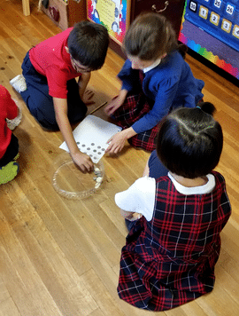 kirby hall school second grade students counting coins